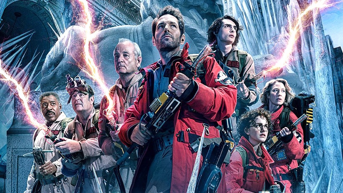 A poster with Ghostbusters old and new firing proton packs for Frozen Empire