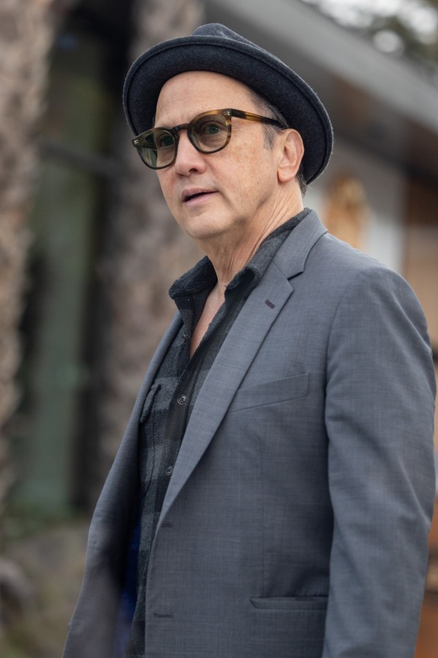 Rob Schneider, spotted outside Erewhon in Studio City, California, in a mismatched gray suit and fedora, has been accused by his daughter of being 'mean'