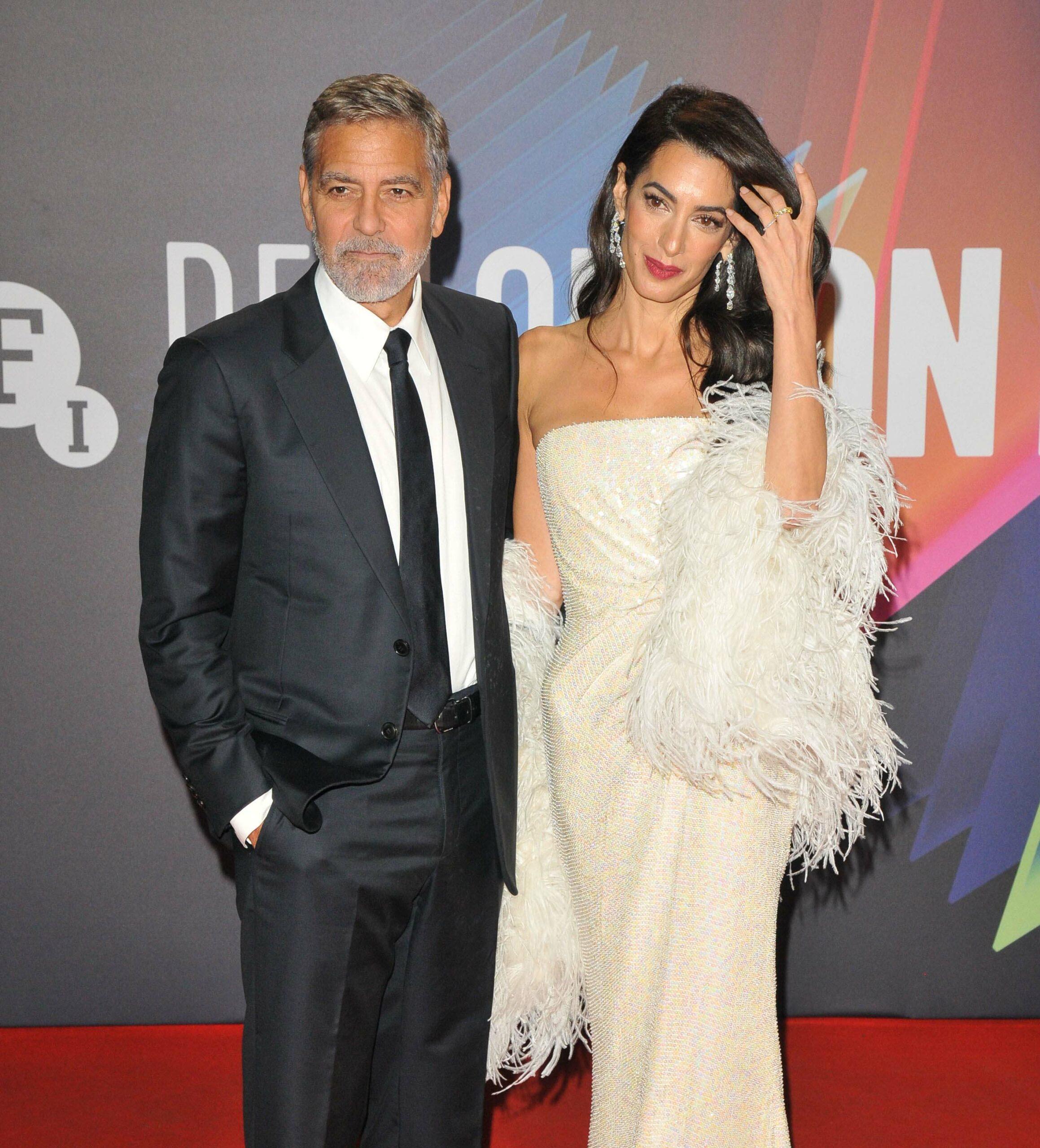 Amal Clooney & George Clooney smiling