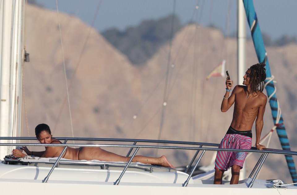 Jaden Smith taking a picture of Khleopatre during their day on a yacht