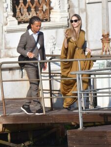 Rapper Akala and Angelina Jolie leaving a hotel in Venice