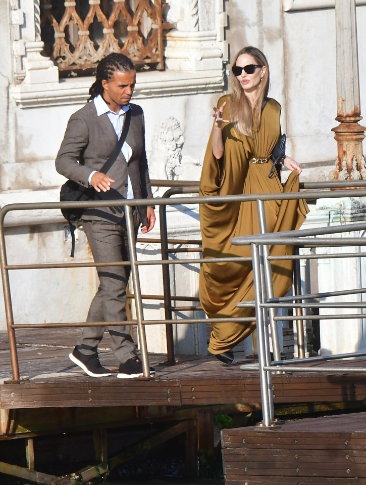 Rapper Akala and Angelina Jolie leaving a hotel in Venice