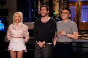 Bowen Yang (on right) with musical guest Sabrina Carpenter and guest host Jake Gyllenhaal on "Saturday Night Live" in May.