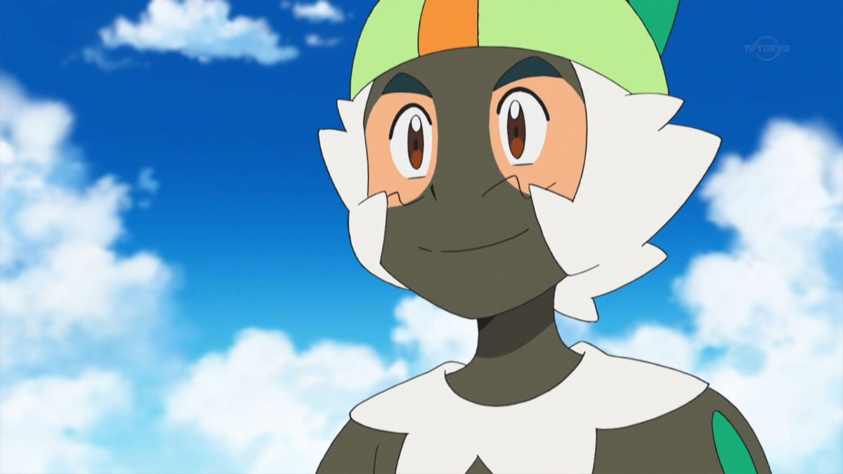 An anime boy in a lemur costume with brown makeup on his face in Pokémon.