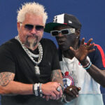 Guy Fieri revealed his slimmed-down appearance during an outing in Paris with rapper Flavor Flav