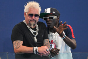 Guy Fieri revealed his slimmed-down appearance during an outing in Paris with rapper Flavor Flav