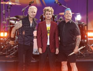 Green Day members Mike Dirnt, Billie Joe Armstrong and Tré Cool perform on ABC's Good Morning America at Rumsey Playfield, Central Park on July 26, 2024 in New York