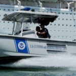 Customs and Border Protection officers patrol the water