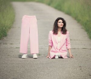 Hülya Marquardt, a 41-year-old wife and mom, sits beside a pair of pants