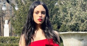 Jenna Ortega Sets Hearts Aflutter In Red Tulle As Gen-Z Fashionista Stuns In A Dior Gown At The Venice Film Festival—Goth Chic Done Right!