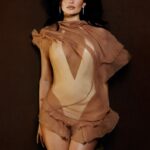 Kylie Jenner stunned in this bold look with a daring neckline