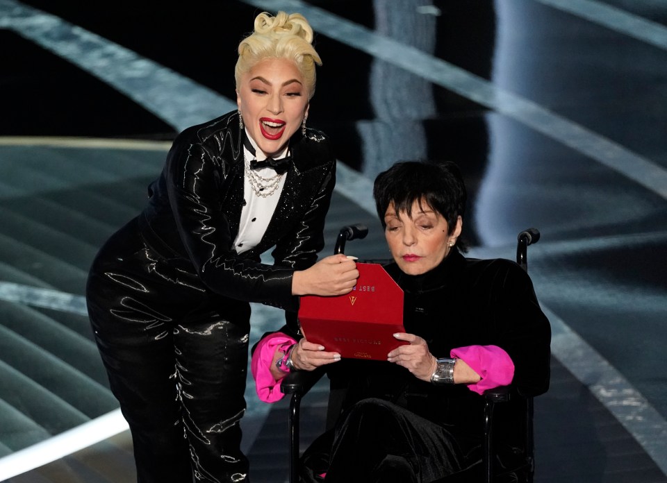 Lady Gaga, left, and Liza Minnelli present the award for best picture at the Oscars on  March 27, 2022 at the Dolby Theatre in Los Angeles