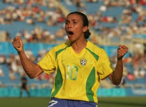 Marta #10 for Brazil celebrates a goal against Australia in the women's football preliminary match on August 11, 2004 during the Athens 2004 Summer Olympic Games at Kaftanzoglio Stadium in Thessaloniki, Greece.