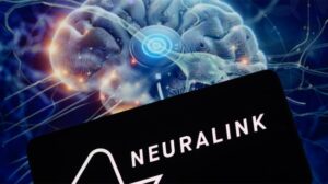 Neuralink logo displayed on smartphone with brain chip visible in background