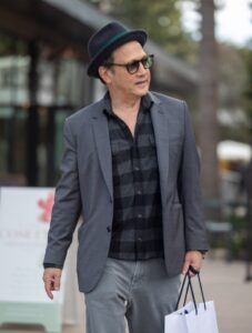 Rob Schneider, seen in Studio City, California, looked glum as he stepped out after his daughter Elle King hurled lofty allegations at him on a podcast