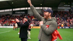 Photo of Ryan Reynolds & Rob McElhenney cheering in FX's Welcome to Wrexham