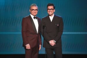 Eugene Levy and Dan Levy speak onstage during the 26th Annual Screen Actors Guild Awards in 2020