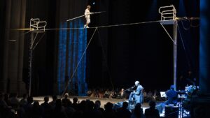 Sting Performs as Philippe Petit Recreates Twin Towers Highwire Stunt