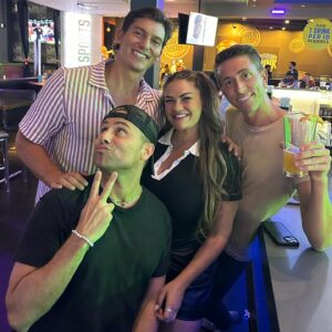Brittany Cartwright (center) has been hanging out with Bachelorette star Tanner Cortad (back, left) as they met at a Bachelorette viewing party at Jax's Studio City bar