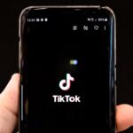 TikTok logo on phone