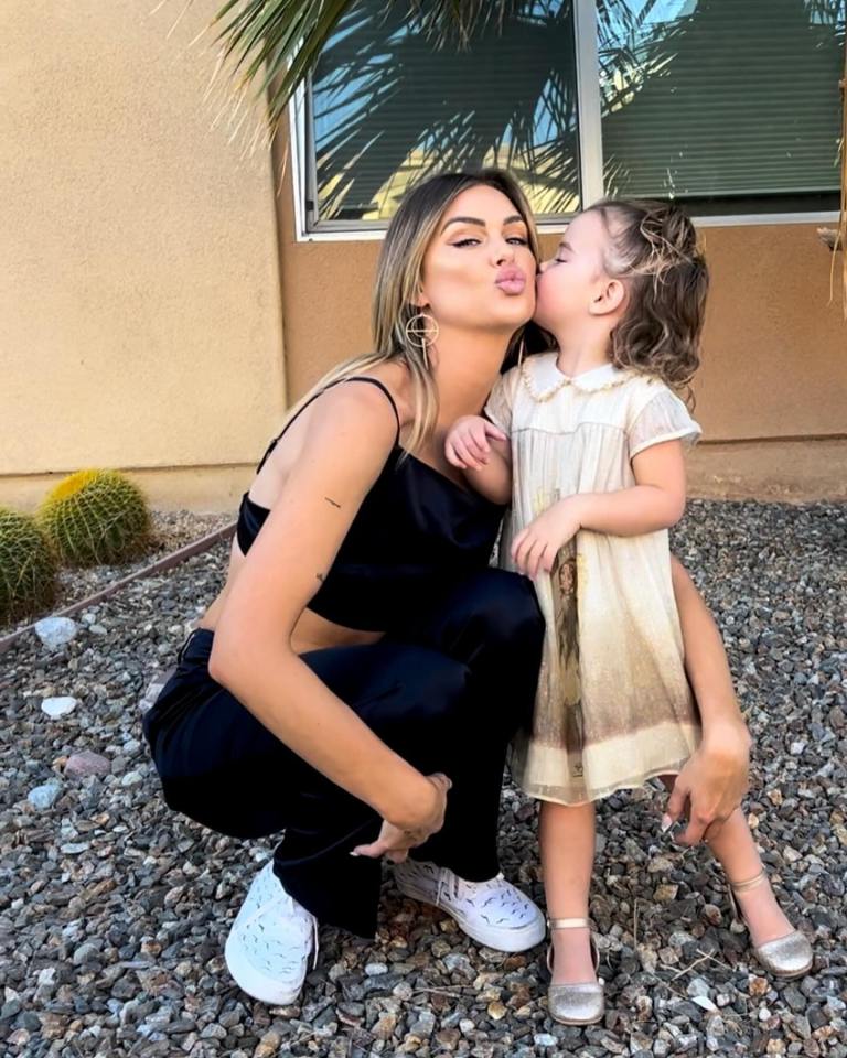 Bravo star Lala Kent is mom to daughter Ocean, seen posing beside her in a brown dress