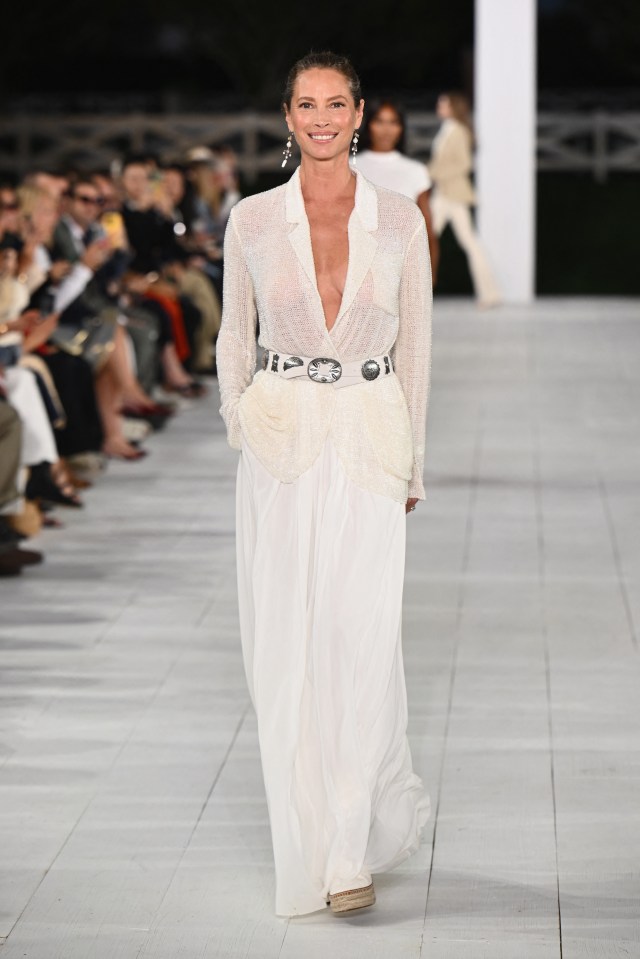 Christy Turlington, 55, looks radiant as she glides down the runway for Ralph Lauren's show during New York Fashion Week