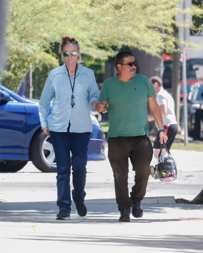 Cybill Shepherd and an assistant walking around in Los Angeles, California