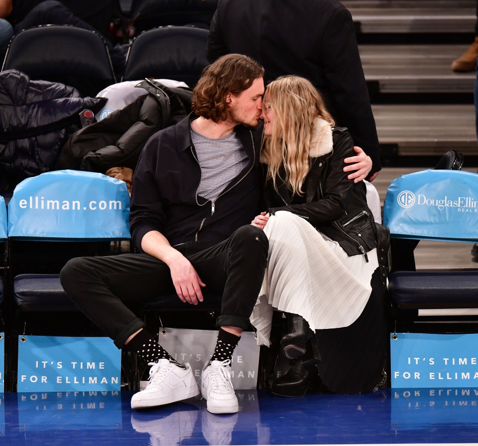 Henry Frye and Dakota Fanning attend a basketball game in February 2018 in New York City