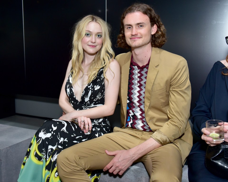 Dakota Fanning and Henry Frye at the Prada Resort 2019 fashion show on May 4, 2018, in New York City