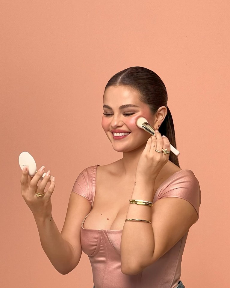 Selena Gomez glowing in a Rare Beauty promo