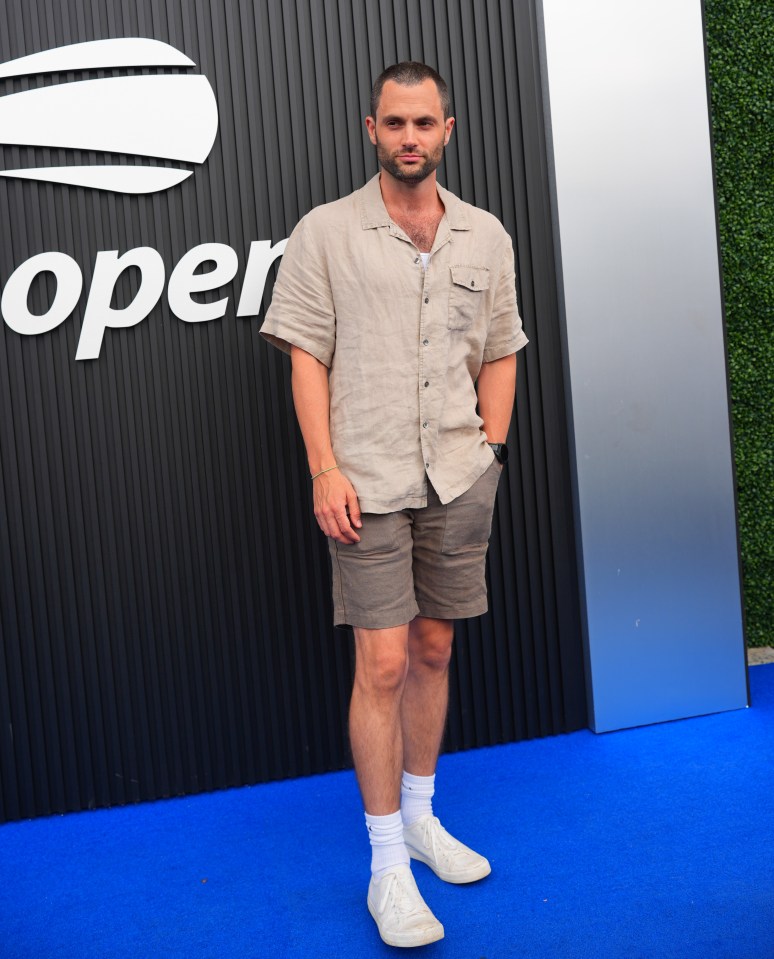 Penn Badgley rocks a sporty look while posing on the Celebrity Blue Carpet held at USTA Billie Jean King National Tennis Center in New York City