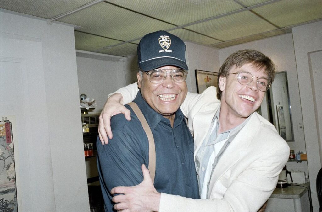 James Earl Jones, left, gets a hug from Mark Hamill.