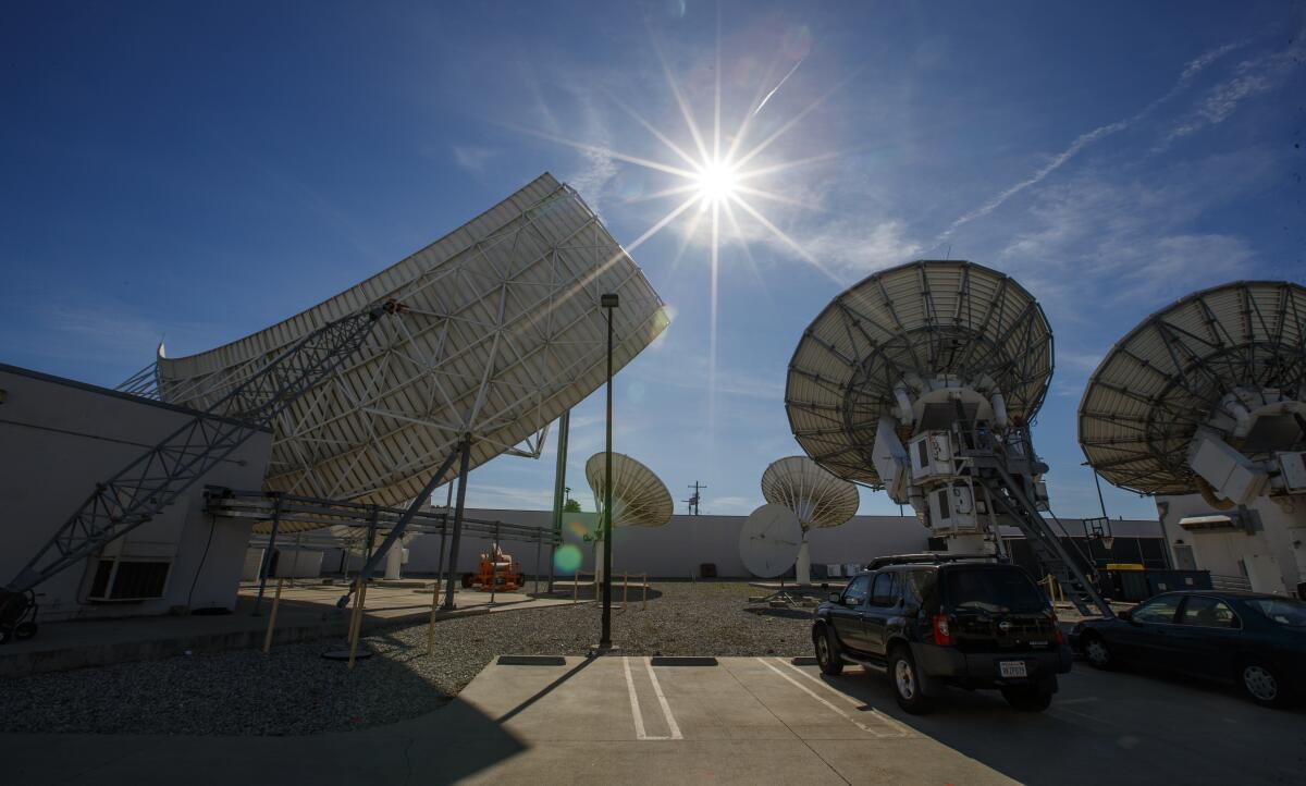 DirecTV satellite dishes. (Allen J. Schaben / Los Angeles Times)