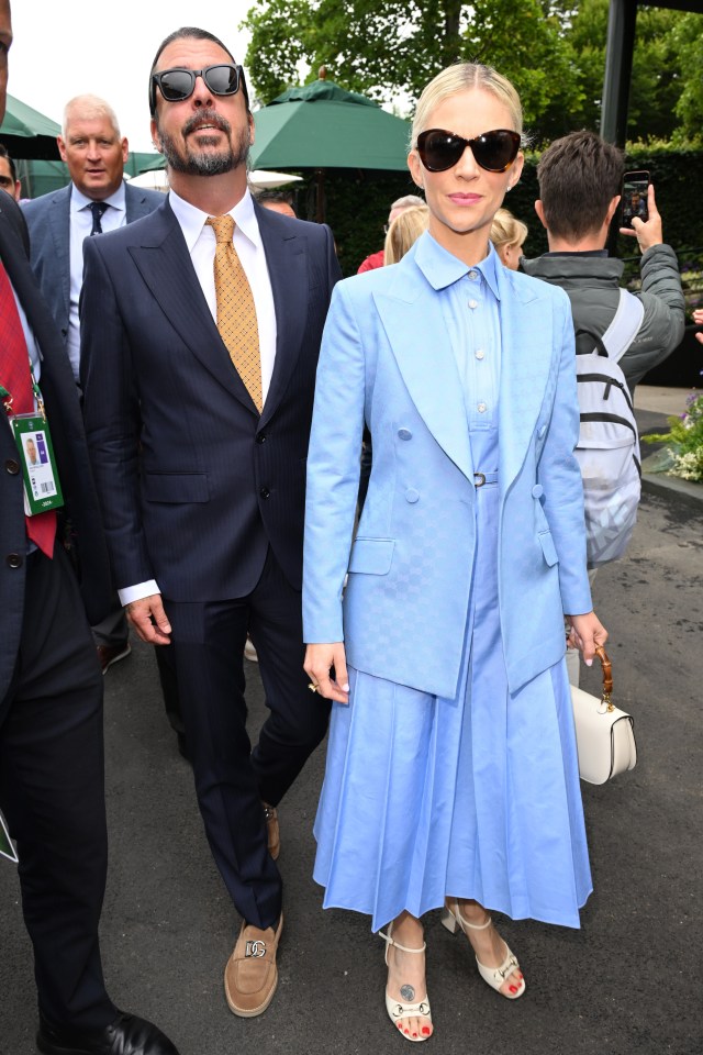 Dave Grohl poses with wife Jordyn Blum during day two of the Wimbledon Tennis Championships on July 02, 2024 in London, England. (Photo by Karwai Tang/WireImage)