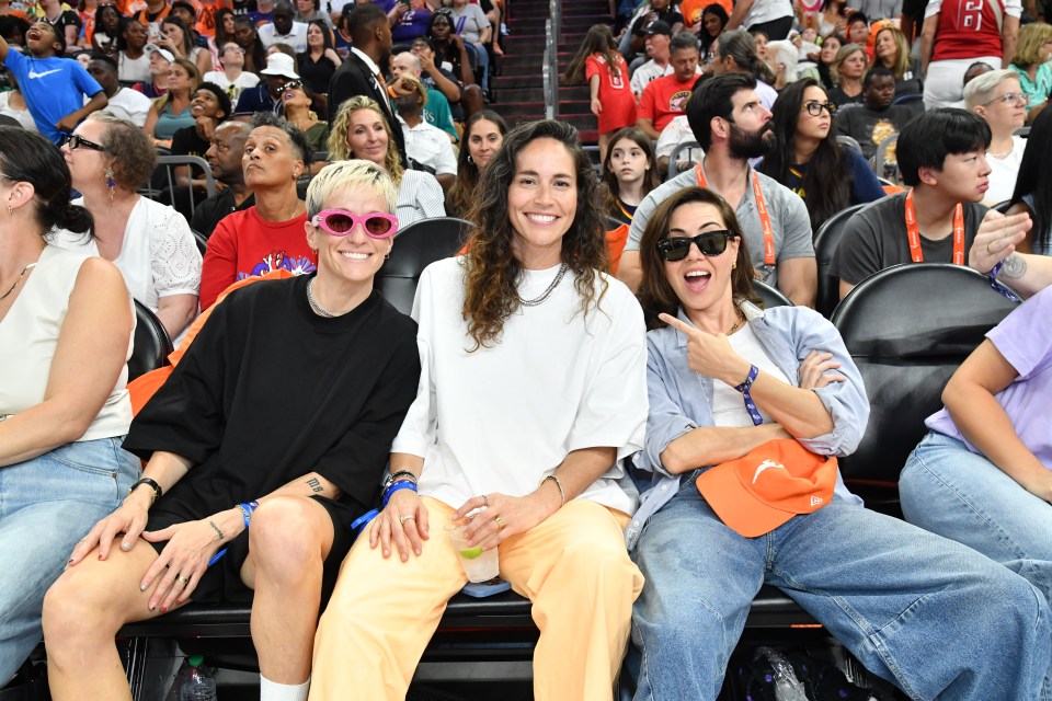 Megan Rapinoe, Sue Bird, and Aubrey Plaza pose for a photo during the 2024 WNBA All-Star Game on July 20, 2024, at Footprint Center in Phoenix, Arizona