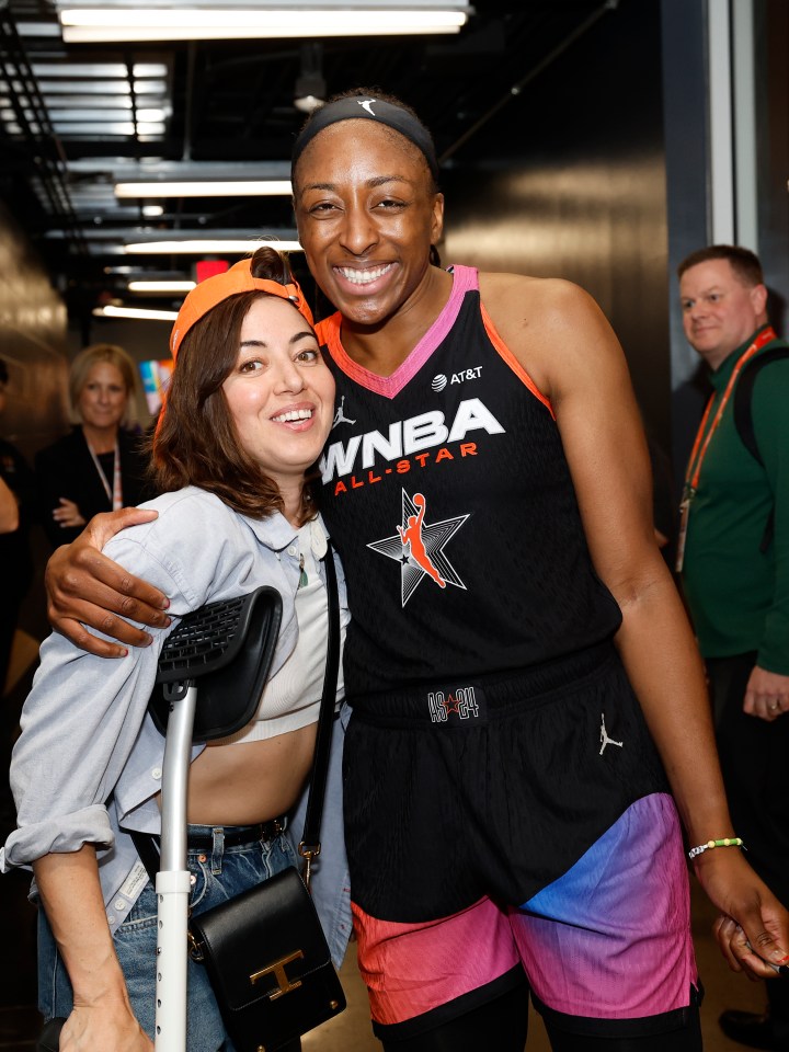 Nneka Ogwumike of Team WNBA pictured embracing Aubrey Plaza after the 2024 WNBA All-Star Game