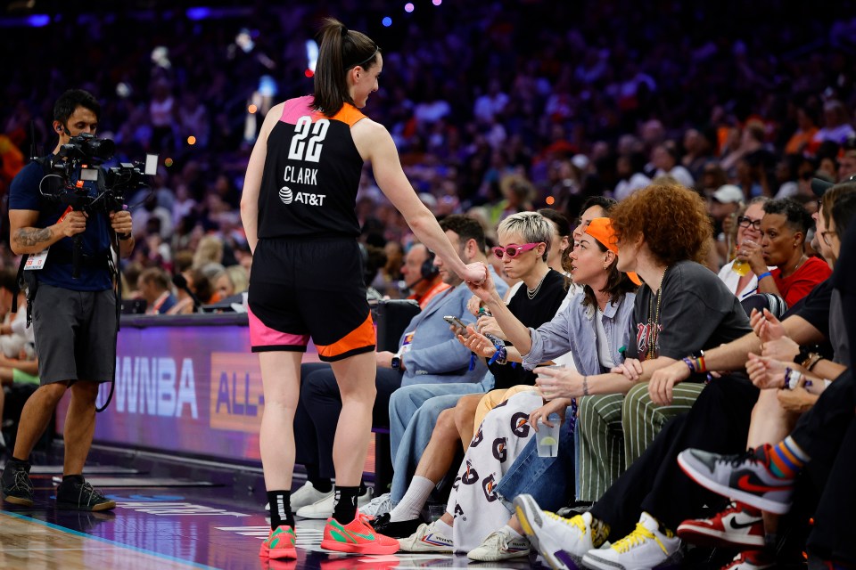 Caitlin Clark of Team WNBA greeting Aubrey Plaza during the second half of the 2024 WNBA All-Star Game