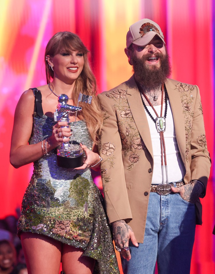 Taylor Swift and Post Malone accepting their award for Video of the Year at the Video Music Awards on September 11, 2024