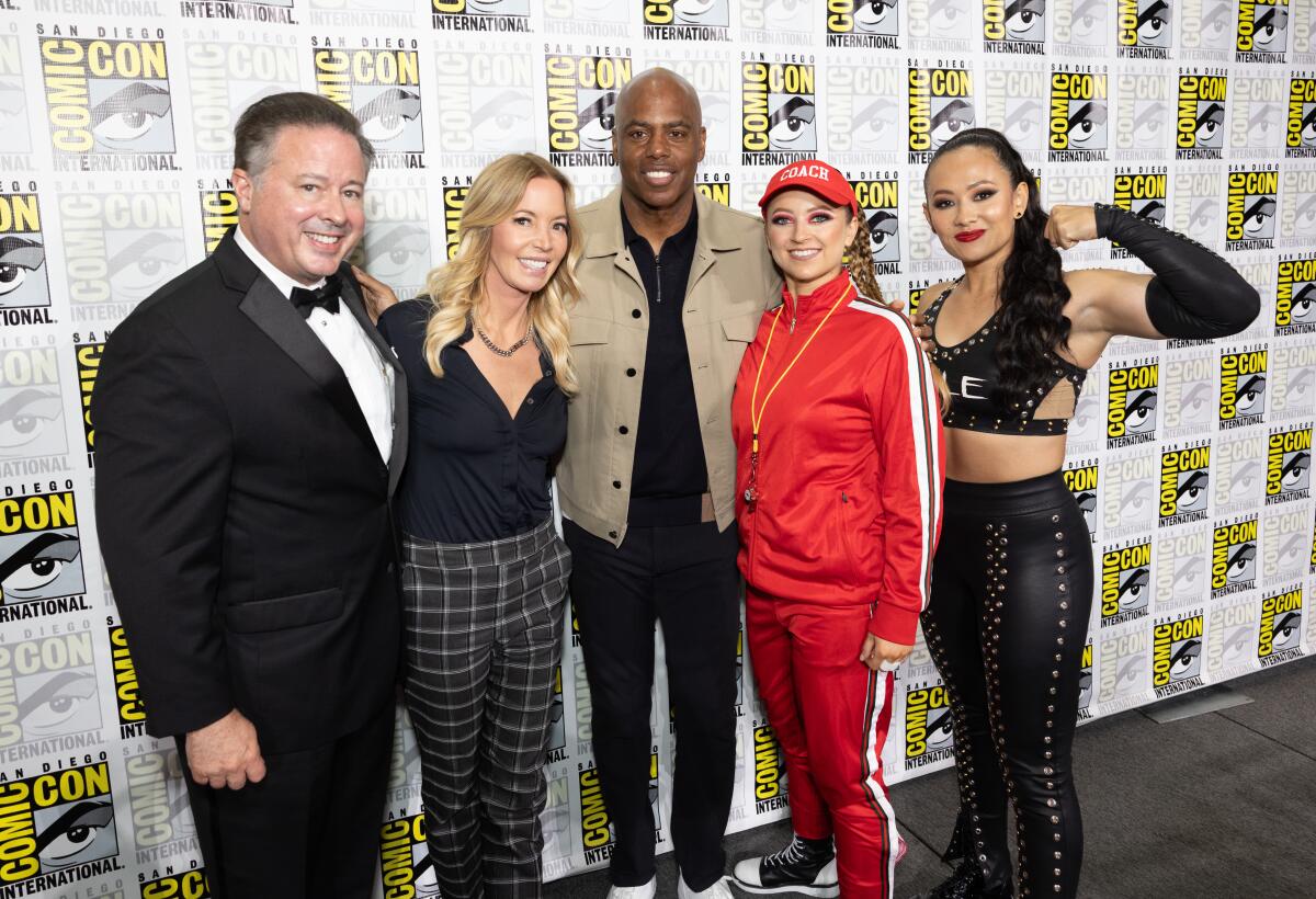 From left, David McLane, Jeanie Buss, Kevin Frazier, Coach Campanelli and Genesis at the 2024 San Diego Comic-Con