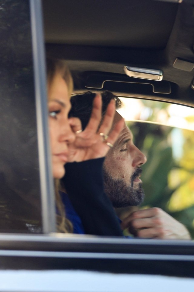 I'm Real hitmaker Jennifer looked to be wiping something from her eye in the tense exchange in the car