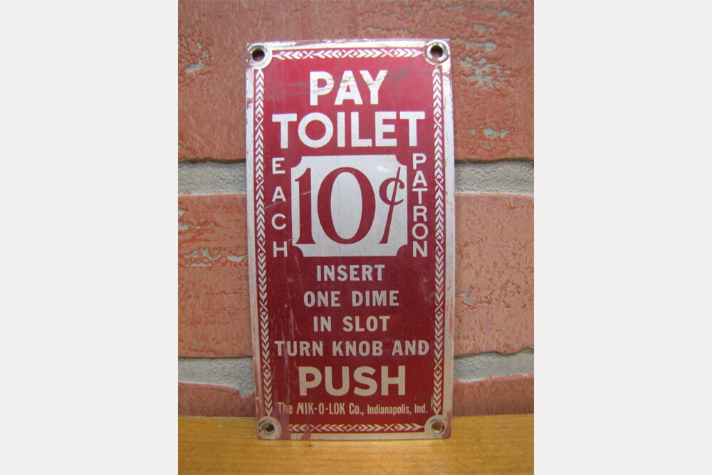 Pay toilet sign 1970s