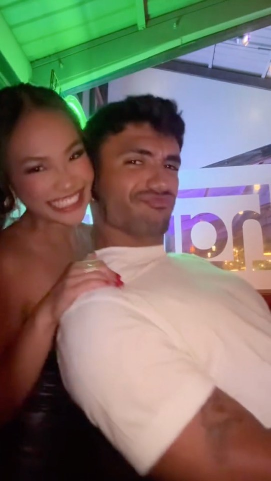 Jenn cuddles up to Jonathon at the party in a new TikTok