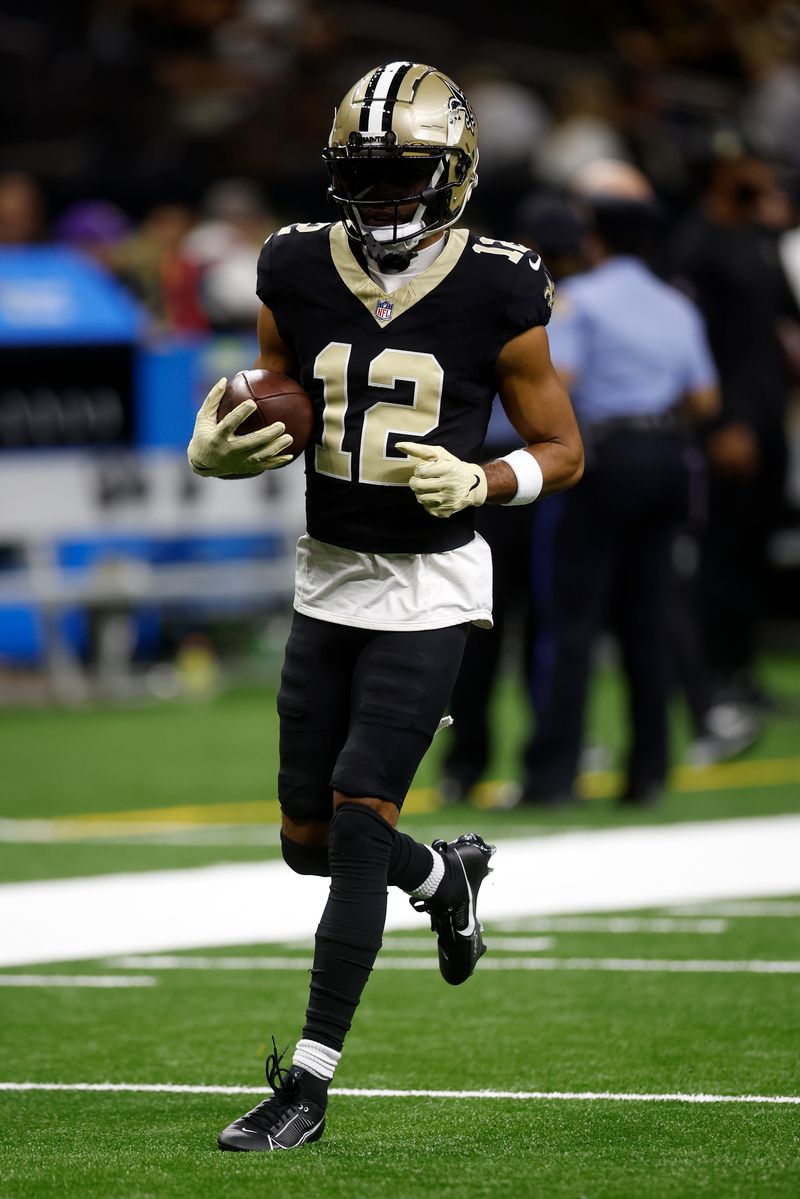 Chris Olave #12 of the New Orleans Saints in action against the Carolina Panthers at Caesars Superdome on September 08, 2024 in New Orleans, Louisiana. (Photo by Chris Graythen/Getty Images)