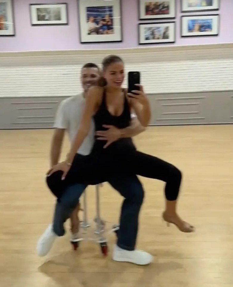 Gleb gets extra touchy-feely with Brooks during a DWTS rehearsal