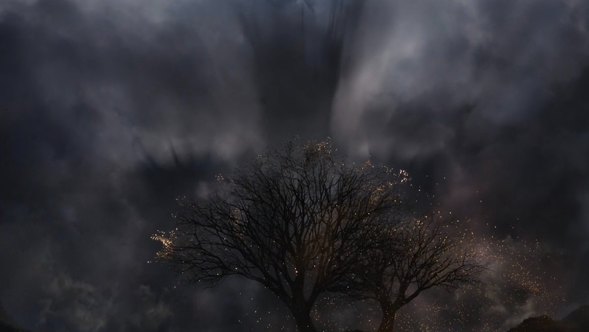 The giant shadow of Morgoth looms over the Tree of Valinor as he snuffs it out on The Rings of Power