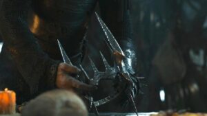 The crown of Sauron being placed on a table on The Rings of Power