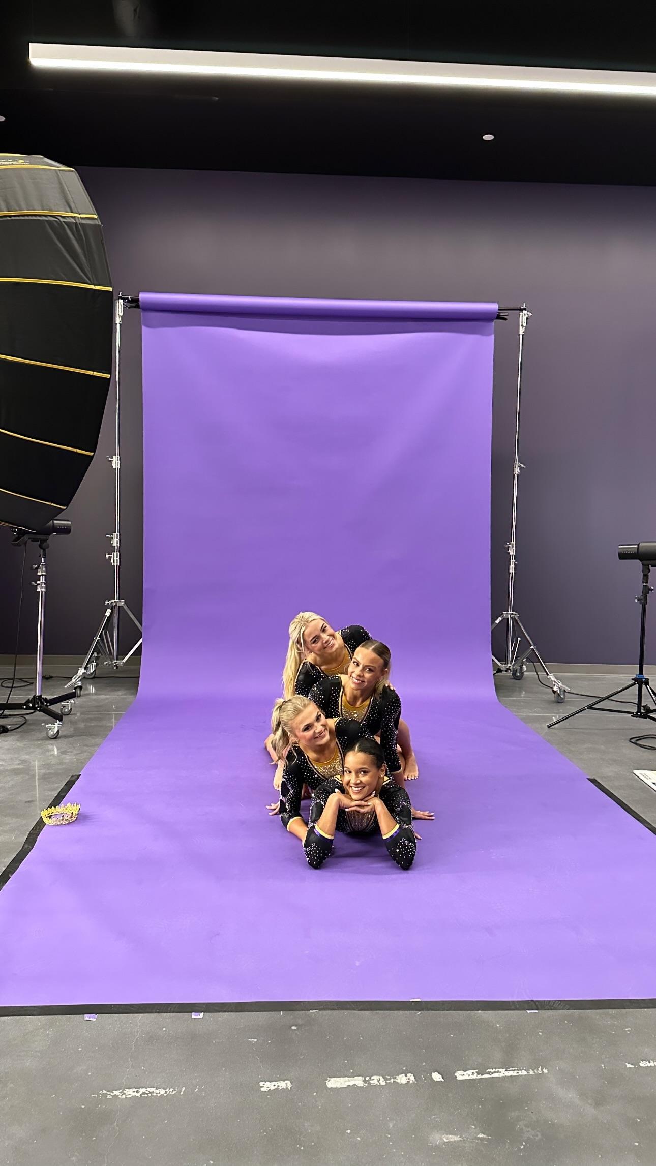 Olivia Dunne poses with her LSU Gymnastics teammates.