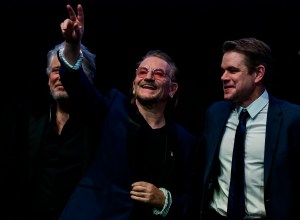 Actor Matt Damon (R), Irish singer Bono (C), and Irish musician Adam Clayton (L) greet the public after a screening of the film 'Kiss the Future' presented in the Berlinale Special section at the Berlinale, Europe's first major film festival of the year, in Berlin on February 19, 2023. 