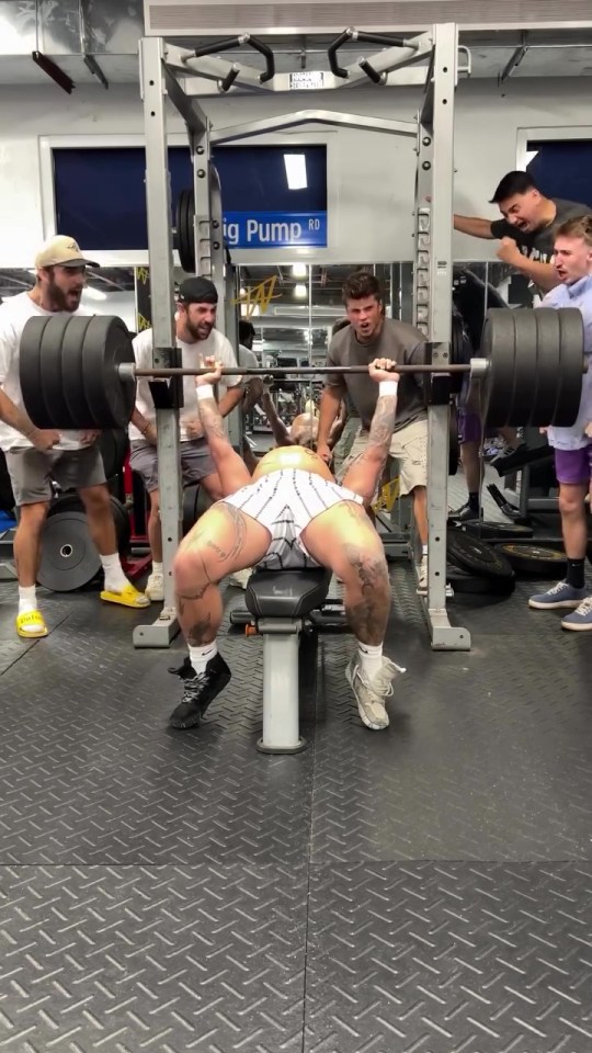 The YouTuber left his followers baffled by posting a video of himself bench-pressing fake weights while wearing a fat suit