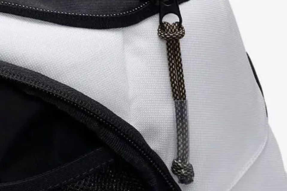 The stolen zippers are often tied to the thief's own bag